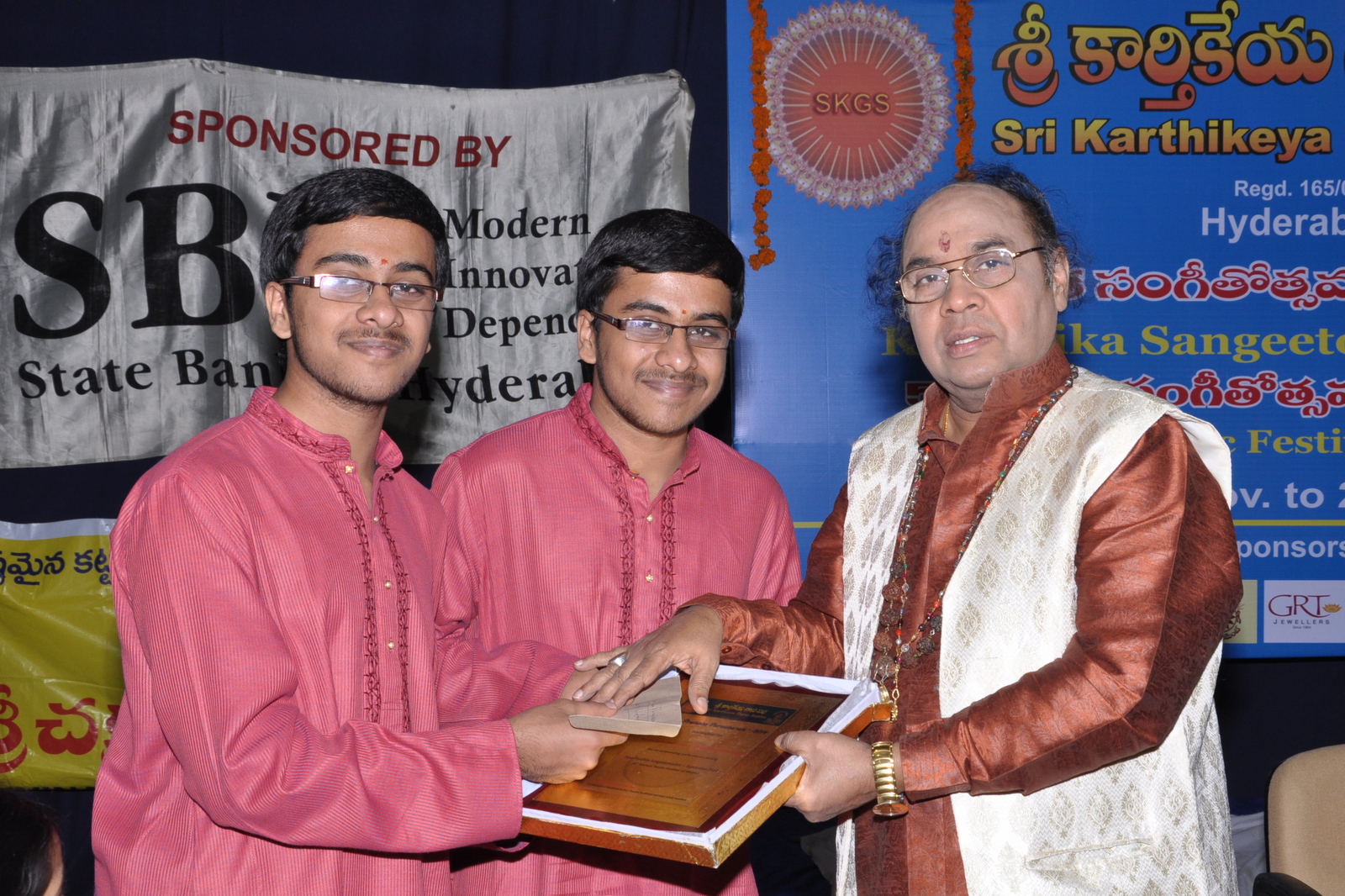 Yuva Pratibha Puraskaram 2014 awarded to Sri Ambale Heramba & Sri Ambale Hemantha . Award given by Mridangam Maestro Dr. Yella Venkateswara Rao
